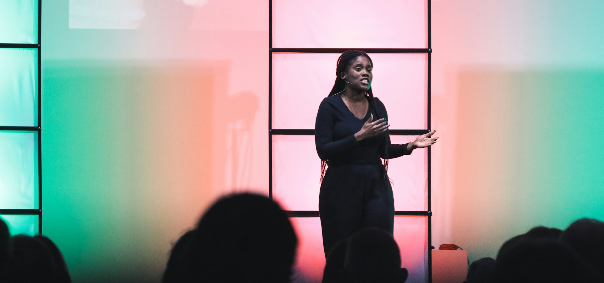 A facilitator presenting to an engaged audience at a professional training session